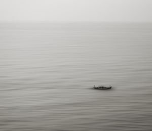 High angle view of boat sailing in sea