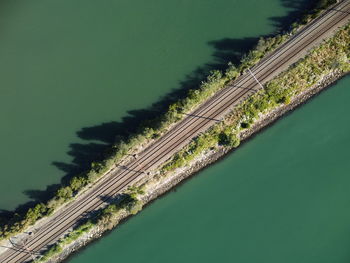 High angle view of train line over the water