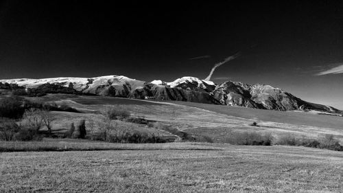 Scenic view of mountains against clear sky