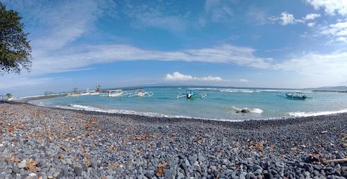 Scenic view of beach against sky