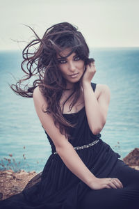 Beautiful young woman on beach