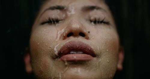 Close-up of woman with eyes closed