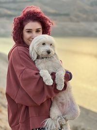 Portrait of woman with dog