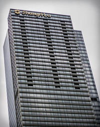 Low angle view of modern building against sky