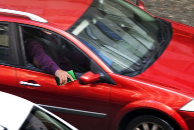 Close-up of red vintage car