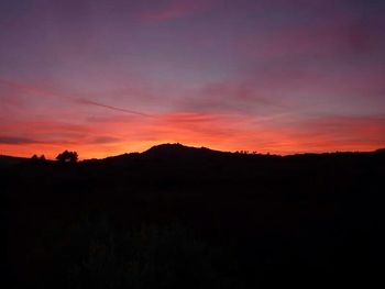 Silhouette of landscape at sunset