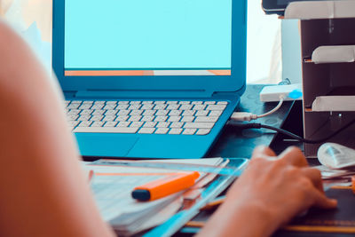 People using laptop on table