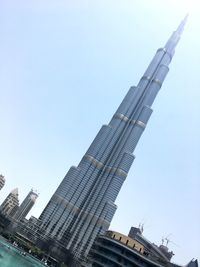 Low angle view of skyscraper against clear sky