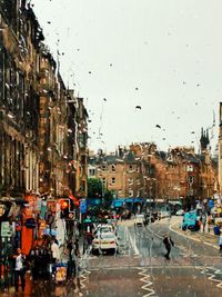 City against sky during rainy season