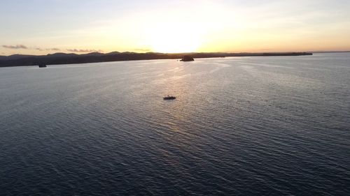 Scenic view of sea at sunset