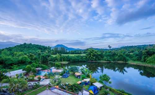 High angle view of plants by lake against sky