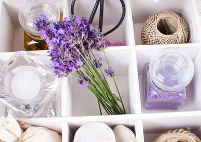 Close-up of purple flower vase on table