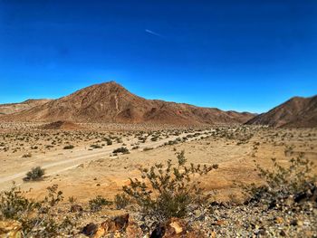 Scenic view of desert against sky