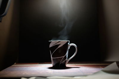 Close-up of tea cup on table