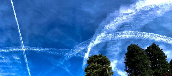 Low angle view of vapor trail in sky