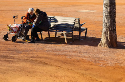 People sitting on bench