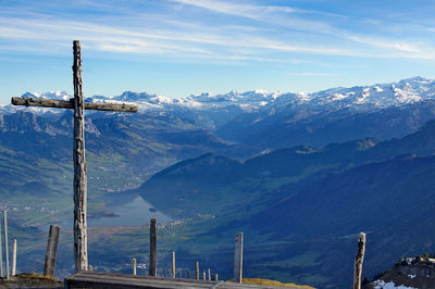 Scenic view of mountains against blue sky