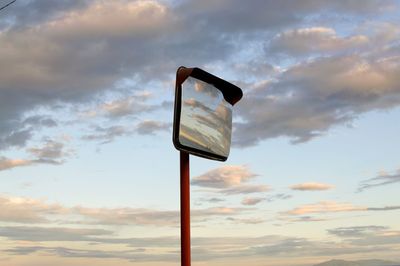 Low angle view of street light against sky