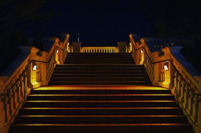 Low angle view of illuminated staircase at night