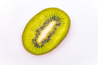 Close-up of bananas against white background