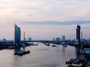 Scenic view of river against sky during sunset