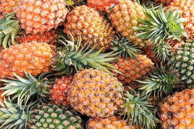 Full frame shot of pineapples for sale at market stall