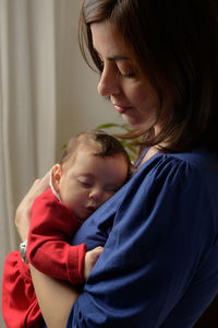 Portrait of mother and son at home