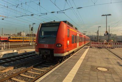 Train on railroad station platform against sky