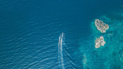 High angle view of blue sea