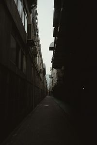 Narrow alley along buildings