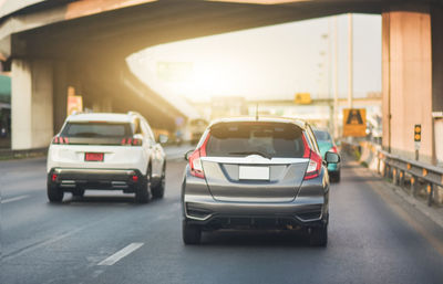 Cars on road in city