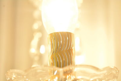 Close-up of illuminated light bulb