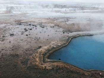 View of steam emitting from hot spring