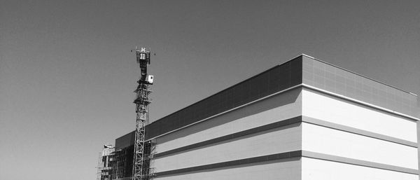 High section of building against clear sky