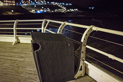 High angle view of table and chairs at night