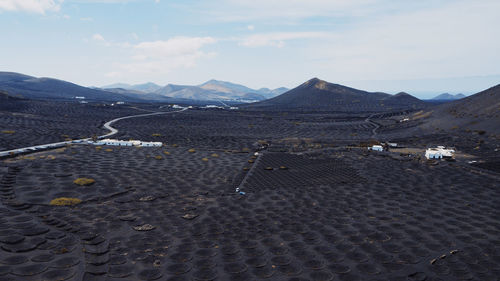 Spain, lanzarote, aerial view of volcanic landscape of bodega la geria vineyard