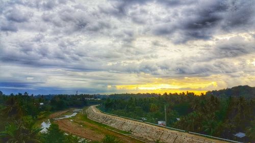 Scenic view of landscape against sky during sunset