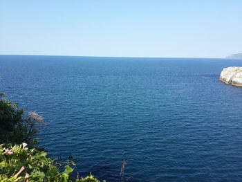 Scenic view of sea against clear sky