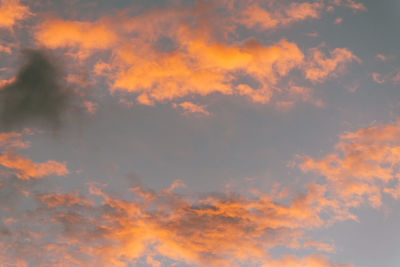 Low angle view of dramatic sky during sunset