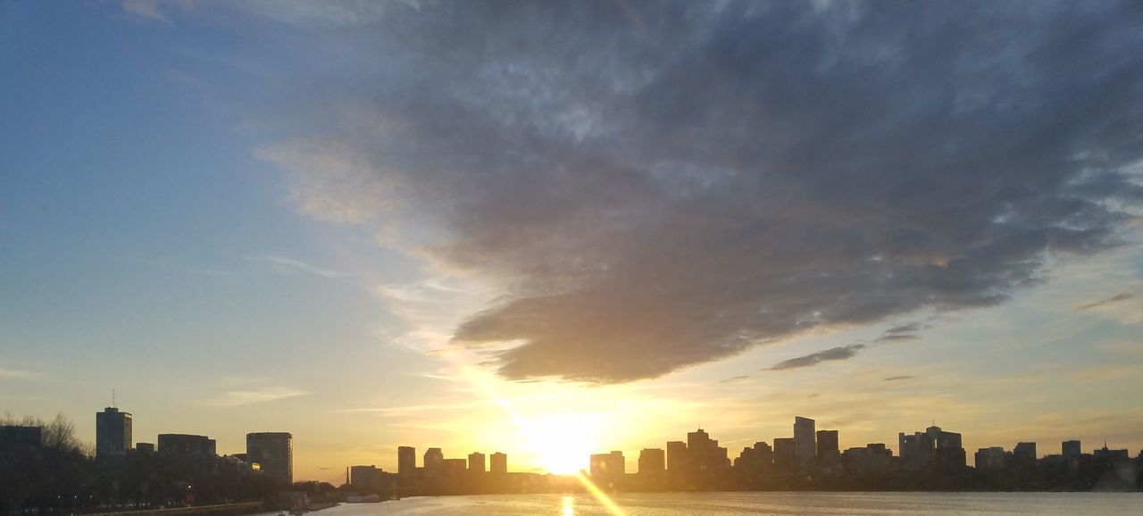 VIEW OF SKYSCRAPERS AT SUNSET