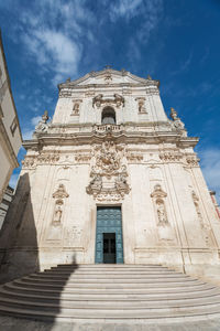 Low angle view of ornate building against sky