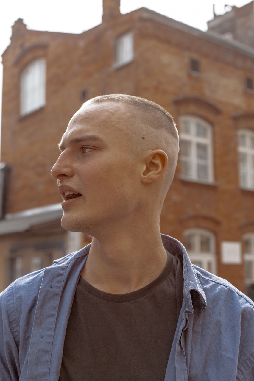 PORTRAIT OF A YOUNG MAN LOOKING AWAY