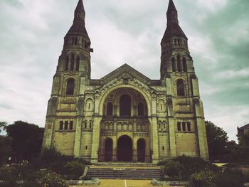 Low angle view of built structure against sky