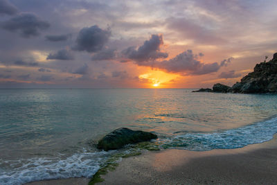 Scenic view of sea against sky during sunset