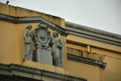 Low angle view of old building against clear sky