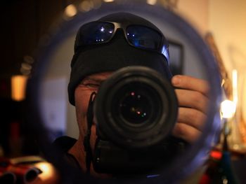 Close-up of person photographing