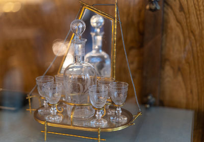 Close-up of glass bottles on table
