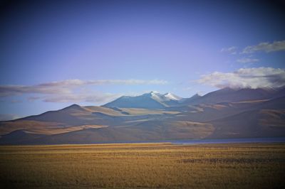 View of landscape against cloudy sky