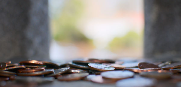 Close-up of coins on table 