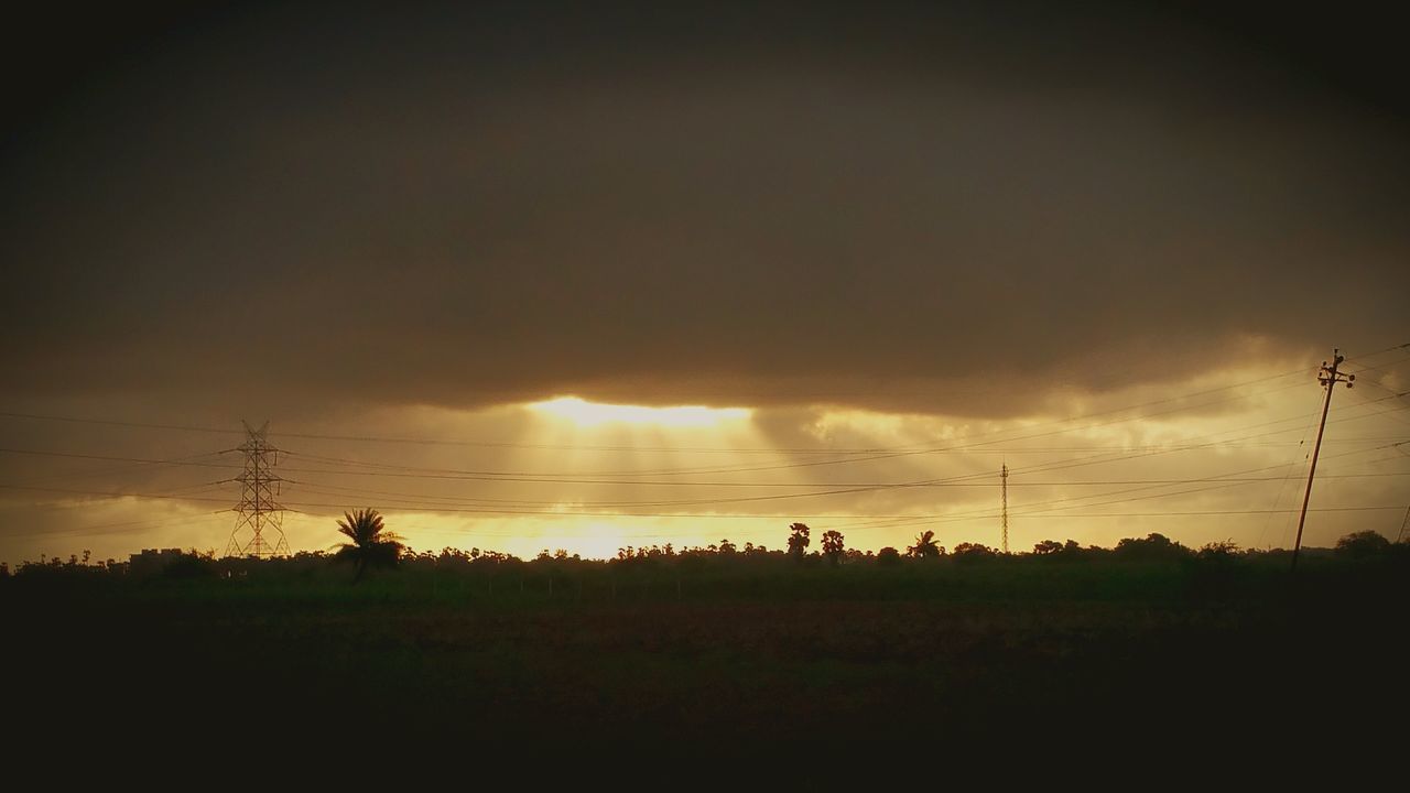 sunset, electricity pylon, sky, power line, tranquility, tranquil scene, silhouette, sun, scenics, beauty in nature, power supply, electricity, landscape, nature, cloud - sky, field, fuel and power generation, idyllic, cloud, cable